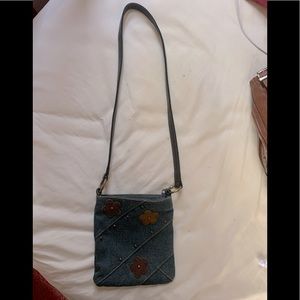 Small denim cross body purse with brown flowers